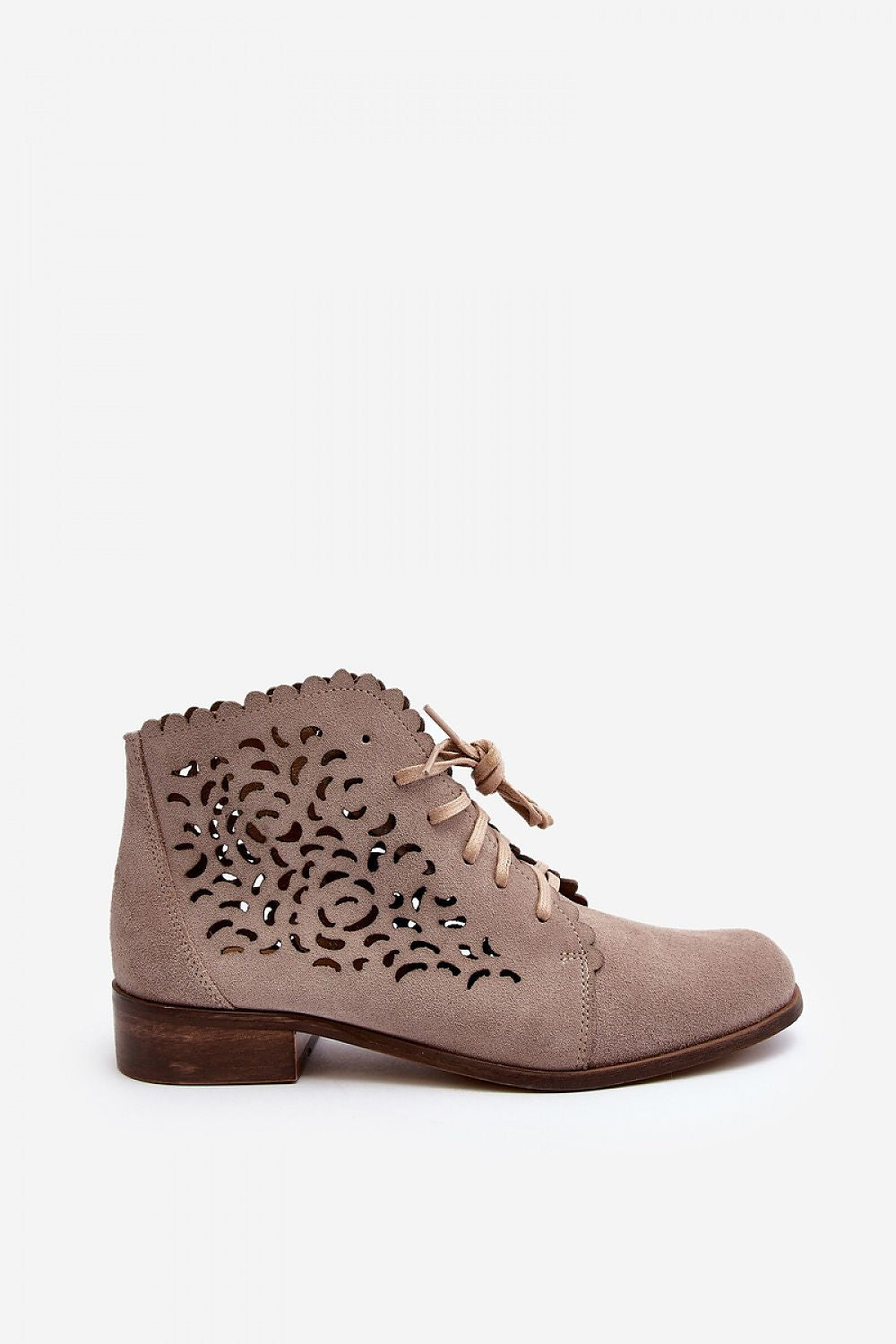 Trendy zippered women's suede leather ankle boots by Step in Style, designed for versatility to pair beautifully with skirts, pants, and dresses.