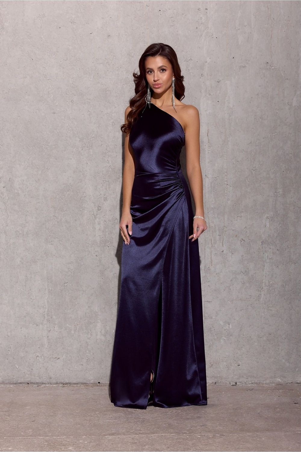 Stylish waist fit and airy skirt of the Inez One Shoulder Satin Long Dress by Roco Fashion, perfect for formal events.