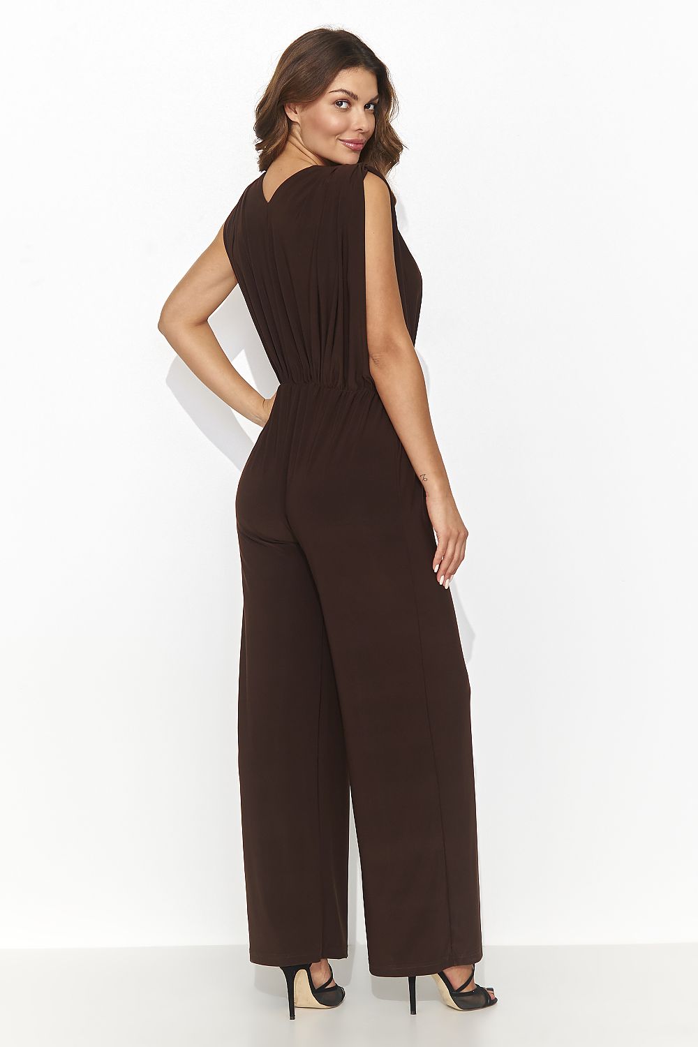 Sophisticated Numinou jumpsuit for women, featuring luxurious fabric, heart neckline, and graceful wide legs, available in diverse classic colours.