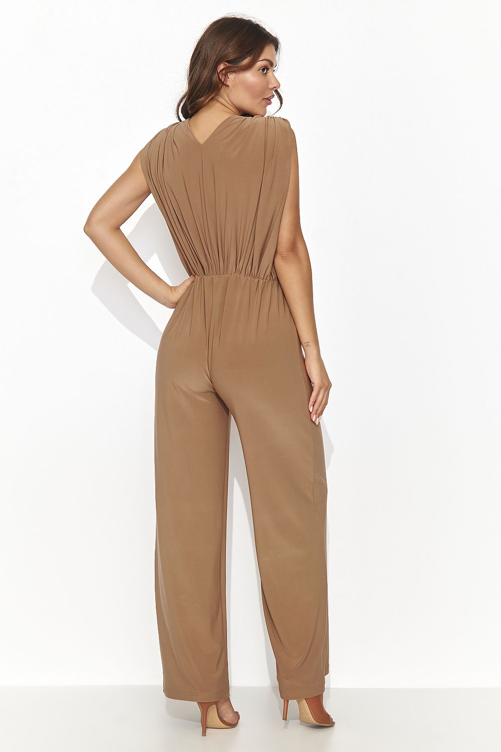 High-quality fabric jumpsuit by Numinou, showcasing a flattering heart neckline and elegant wide leg design.
