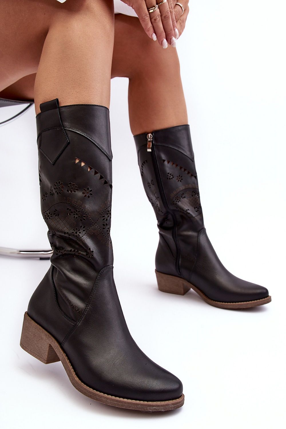 Chic and fashionable leather boots for women by Step in style, highlighting a stunning open-work design, ideal for transitional seasons.