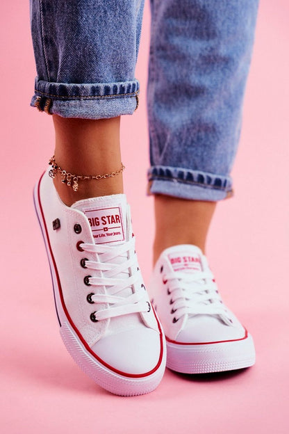 Classic white lace-up sneakers by Step in Style, featuring a timeless design for unparalleled comfort and elegance.