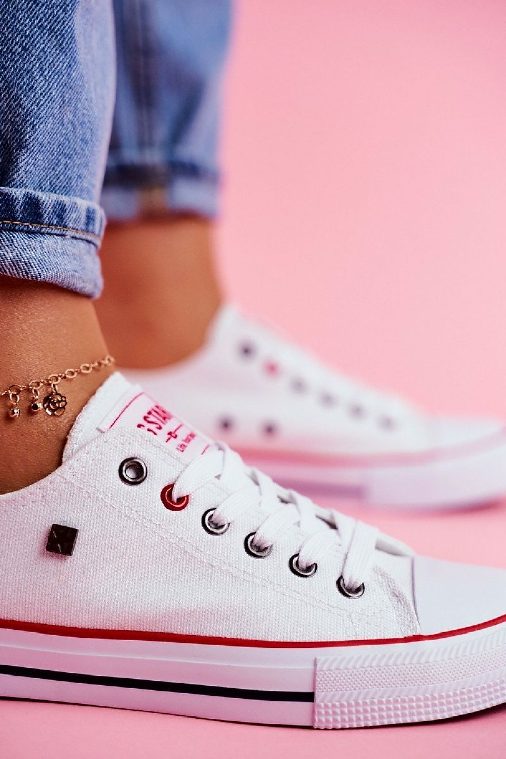 Luxurious low-top white lace-up sneakers from Step in Style, perfect blend of vintage charm and modern comfort.