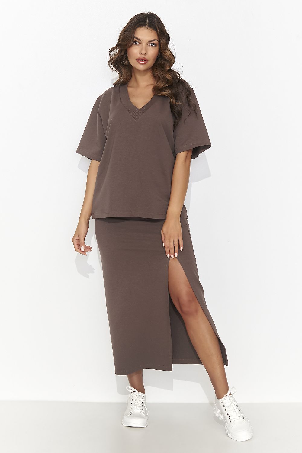 Numinou women's 2-piece set with a sleek pencil skirt and decorative gold plate blouse, perfect for any sophisticated occasion.