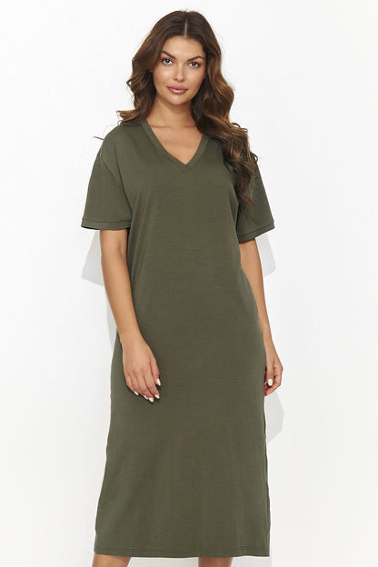 Close-up of Numinou Casual Knitted Dress showcasing the delicate back slit and luxurious cotton fabric.