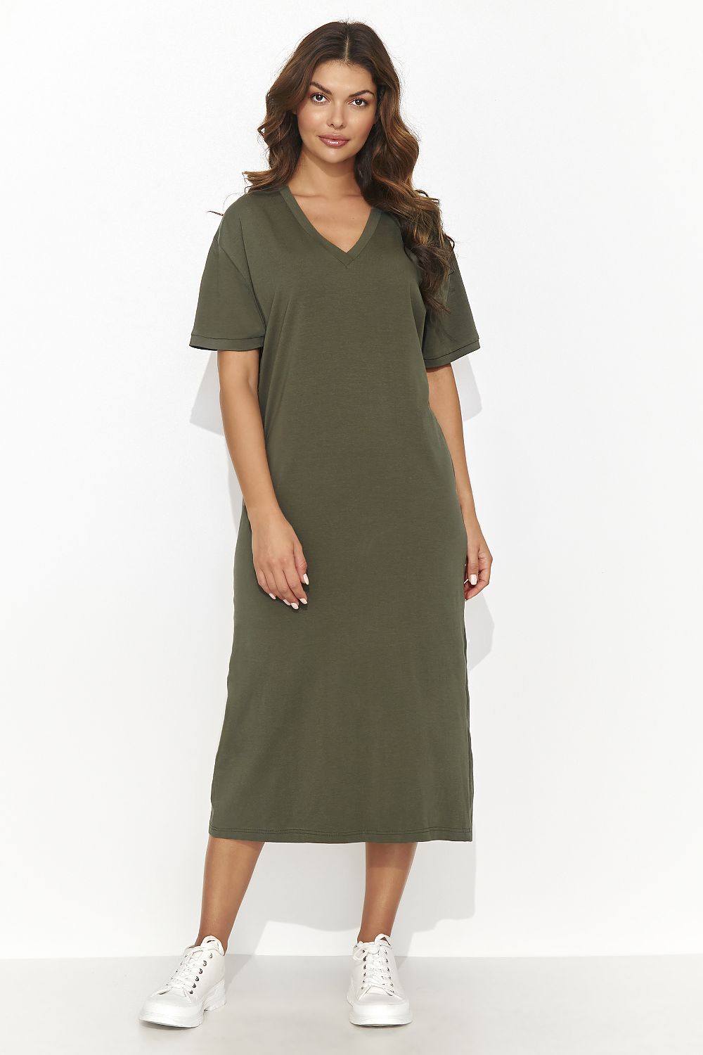 Model wearing Numinou Casual Knitted Dress, highlighting its lightweight charm and sophisticated design.