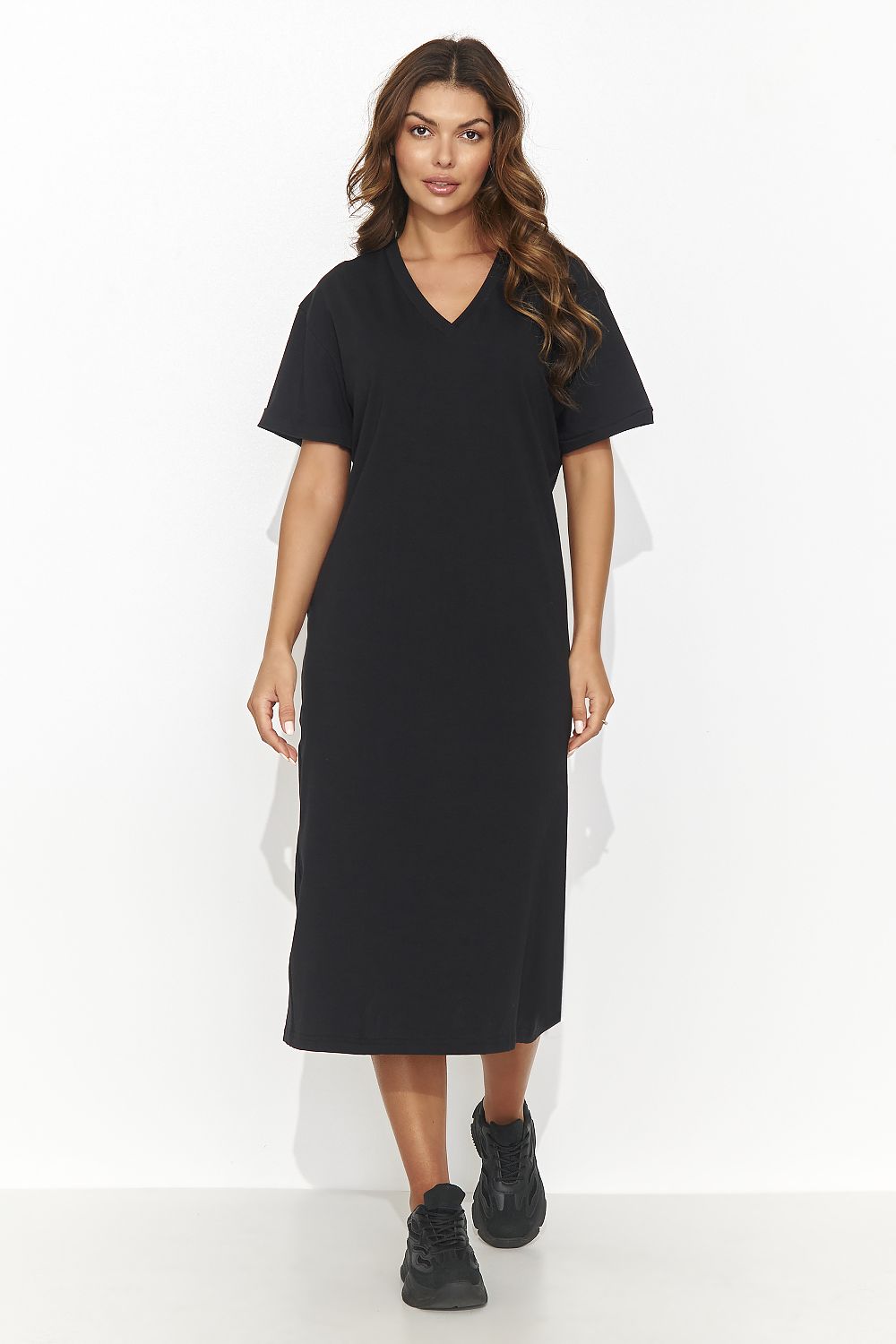 Numinou elegant casual knitted dress featuring a heart neckline and back slit, embodying luxury fashion for delightful summer outings.