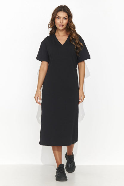 Numinou elegant casual knitted dress featuring a heart neckline and back slit, embodying luxury fashion for delightful summer outings.