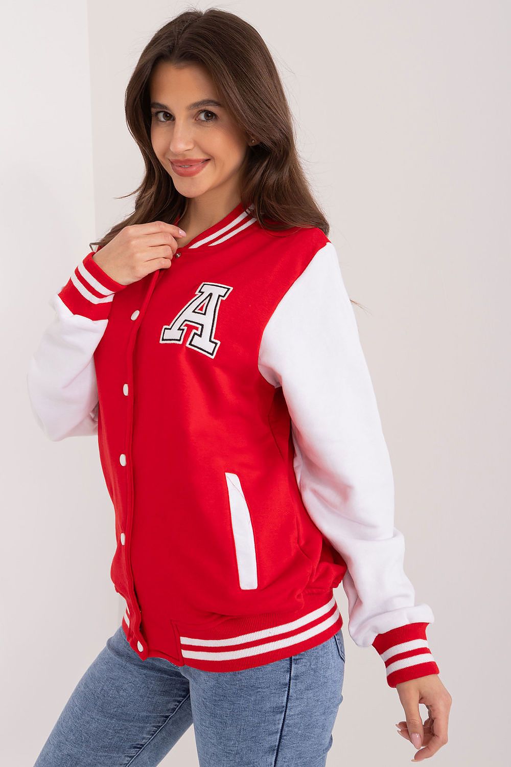 Elegant women's cotton sports sweatshirt by Relevance, featuring a unique snap button closure and sporty vibe, ideal for both casual and active occasions.