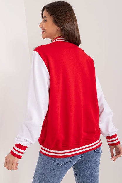 Elegant women’s cotton sports sweatshirt by Relevance featuring snap button closure and ribbed stripes, perfect for adding a touch of luxury to activewear.