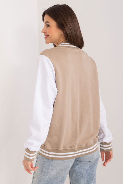 Luxurious cotton sports sweatshirt for women by Relevance, highlighted with decorative patches and a sporty vibe, offering elegance in everyday wear.