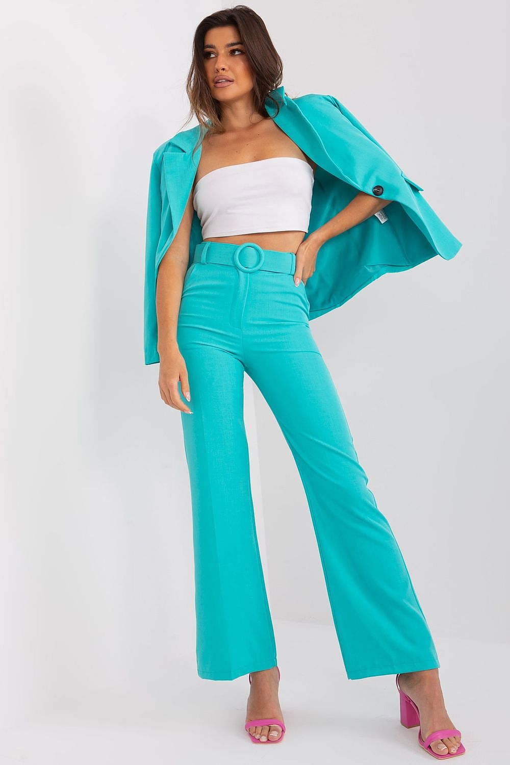 Elegant high-rise flared trousers for women by Italy Moda, crafted from luxurious polyester with a shiny finish, featuring a belt and practical slip pockets, perfect for professional settings.