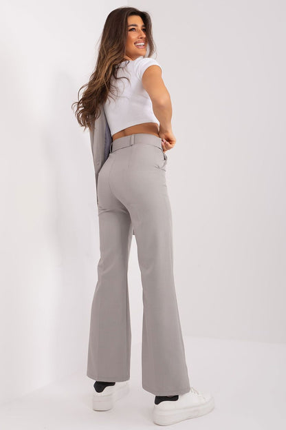 Luxurious women's flared trousers by Italy Moda, featuring an elegant silhouette that enhances the figure, ideal for stylish ensembles.