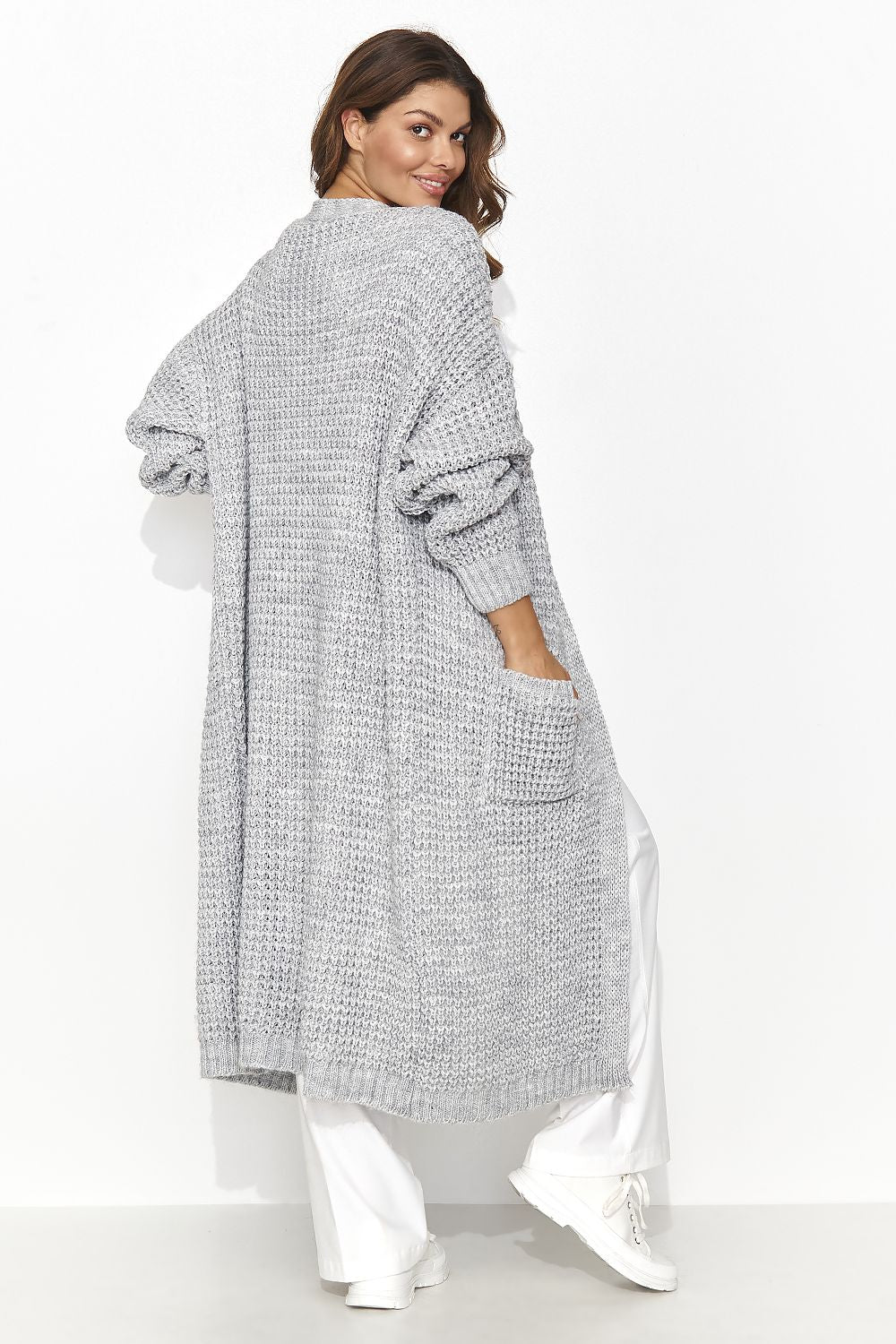Lightweight knee-length cardigan from Numinou, designed for women, showcasing its stylish open front and versatility for various occasions.