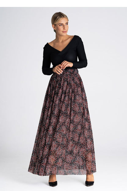 Model wearing the Figl elegant long mesh skirt, illustrating its graceful flow and versatility for various occasions.