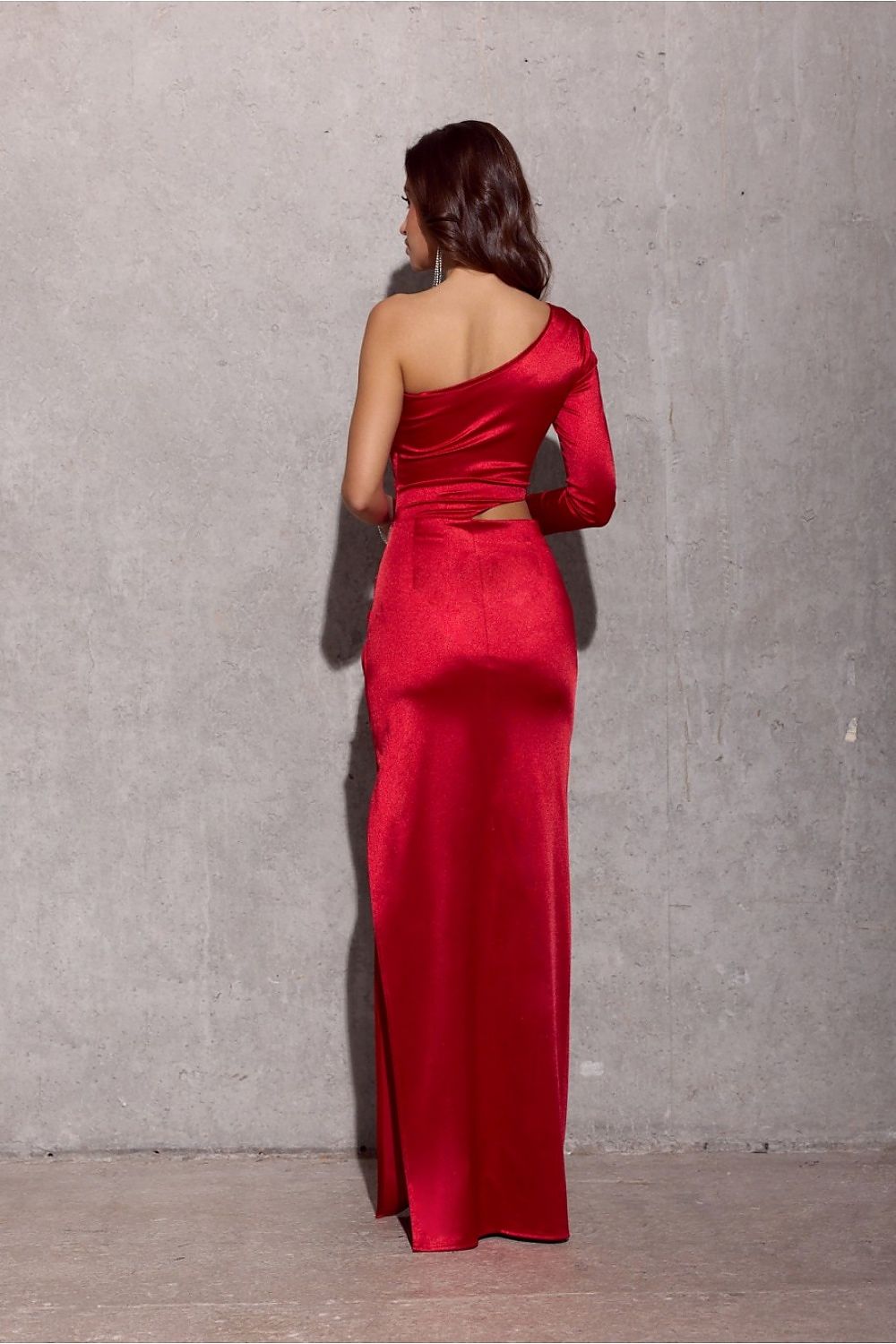 Back view of Roco Fashion's elegant maxi satin dress, featuring a covered zipper for a sleek silhouette.