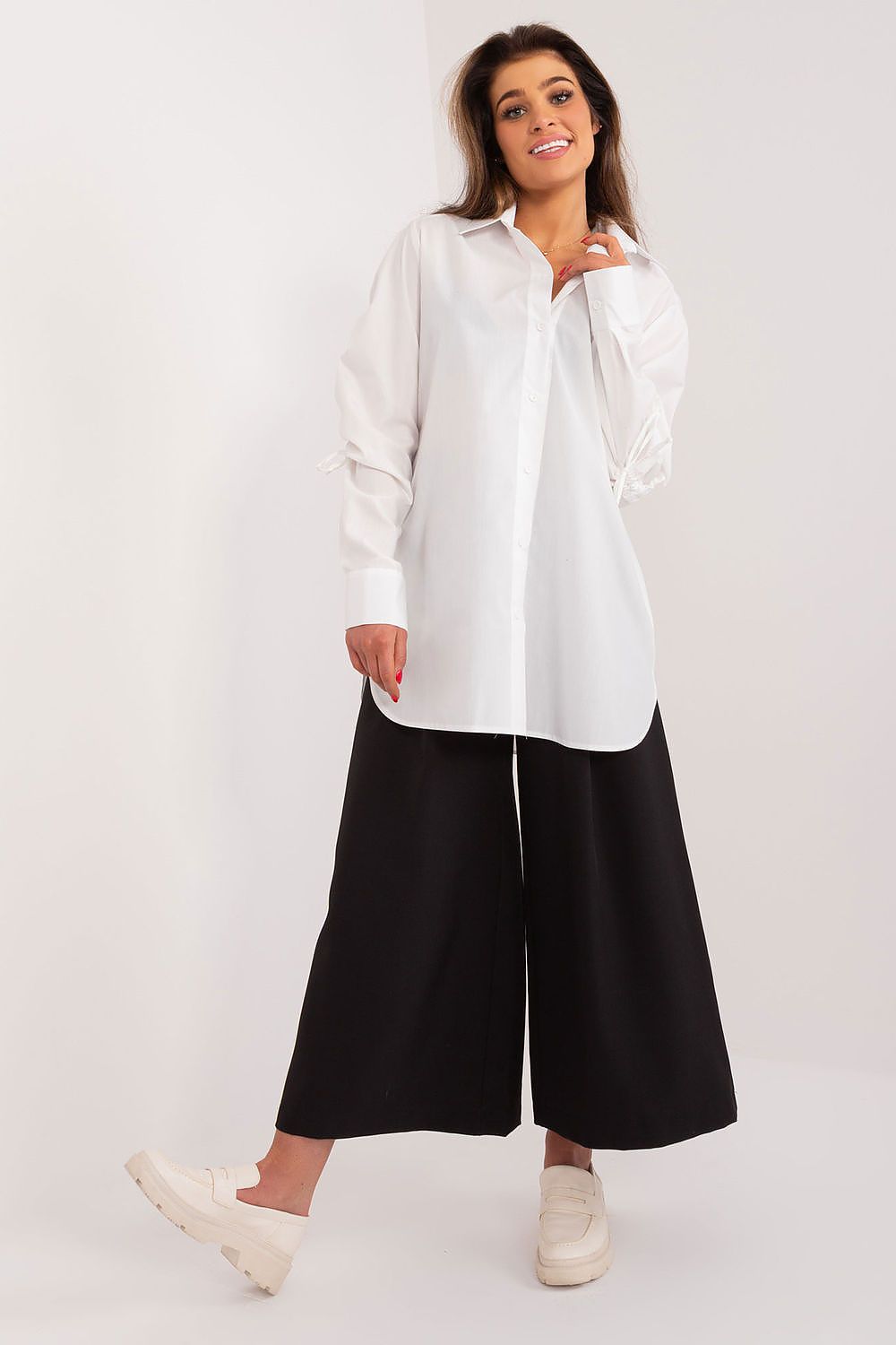 Elegant Lakerta Women's Long Sleeve Casual Shirt featuring unique decorative ribbing on sleeves, made from a comfort-enhancing cotton blend, perfect for stylish everyday wear.