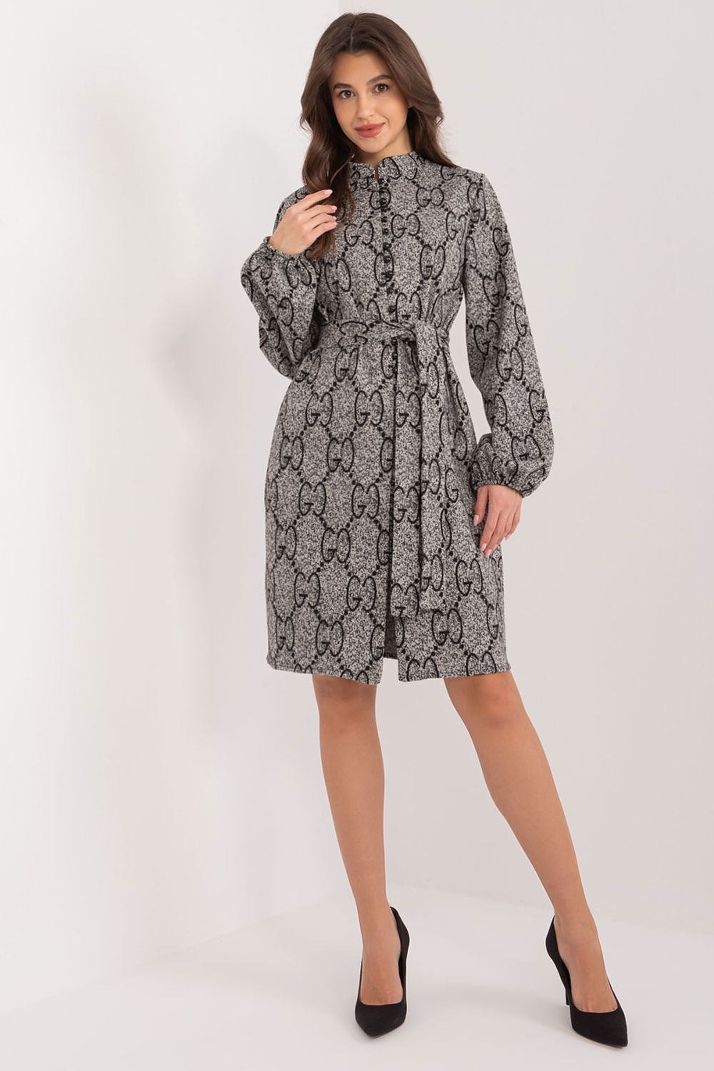 Versatile pre-knee length Lakerta dress designed with a stand-up collar and button closure, ideal for women seeking comfort and elegance in their wardrobe.