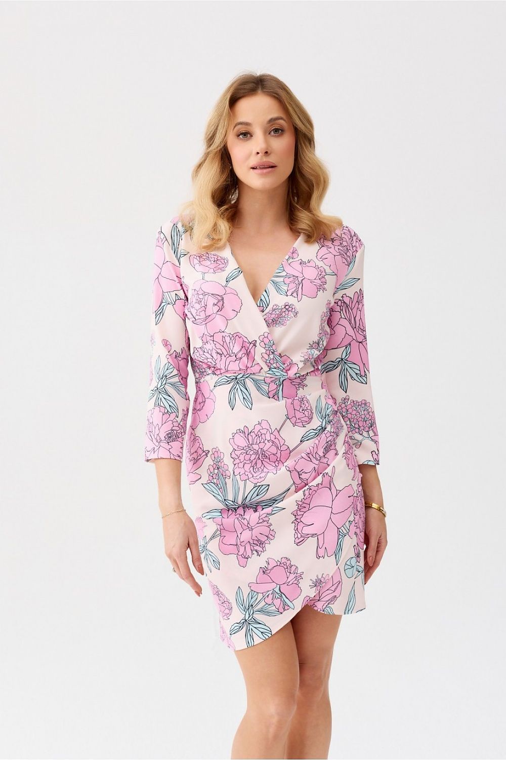 Glamorous close-up of the Odetta Floral Mini Dress by Roco Fashion showcasing the exquisite overlap skirt and oversized envelope neckline for a flattering silhouette.