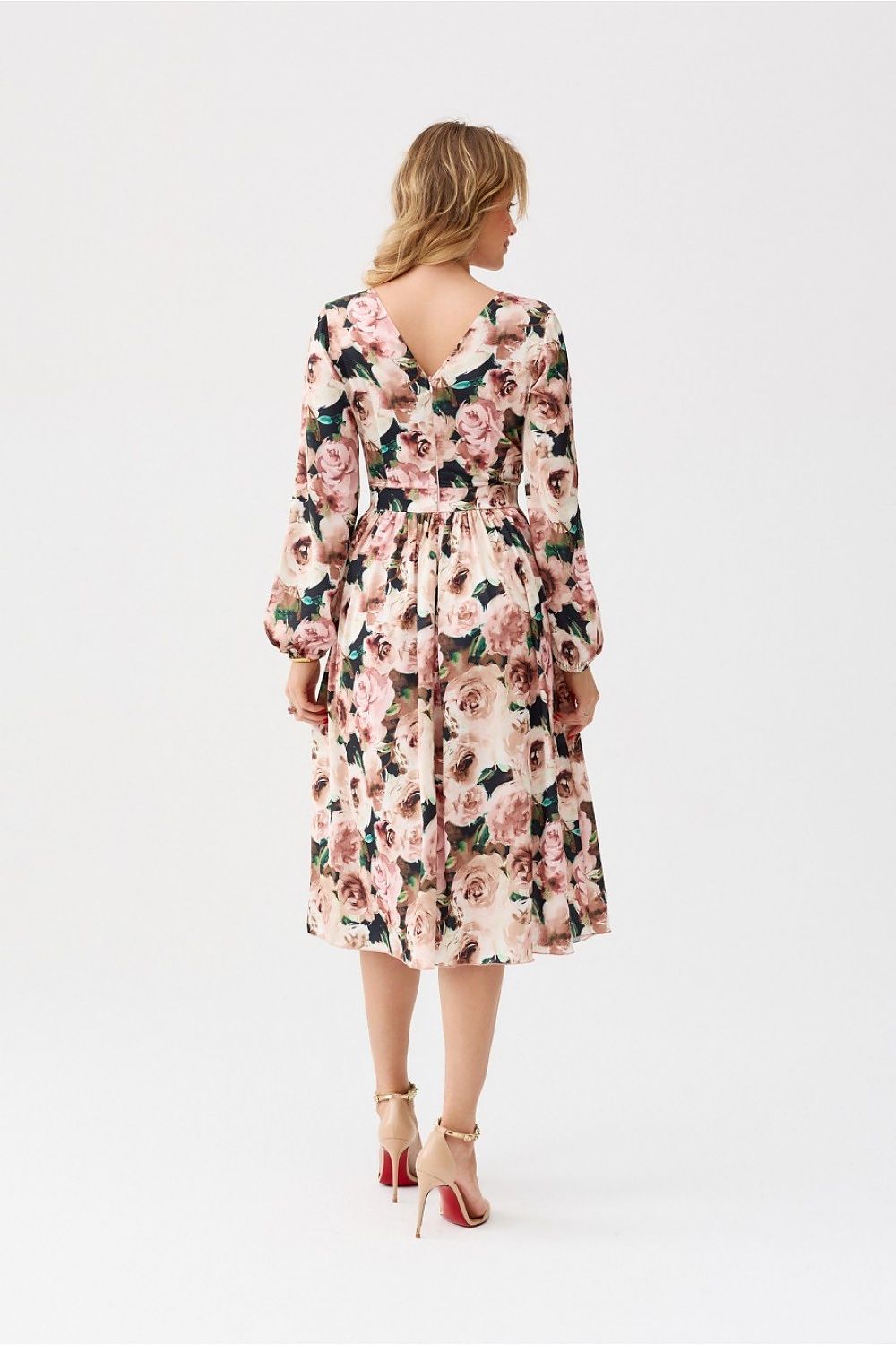 Close-up of Roco Fashion cocktail dress fabric highlighting the luxurious polyester and stylish prints, adding character to any occasion.