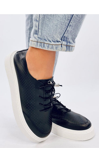 Elegant women's openwork sneakers in eco leather by Inello, featuring a stylish punched texture and high comfort sole for ultimate style and ease.