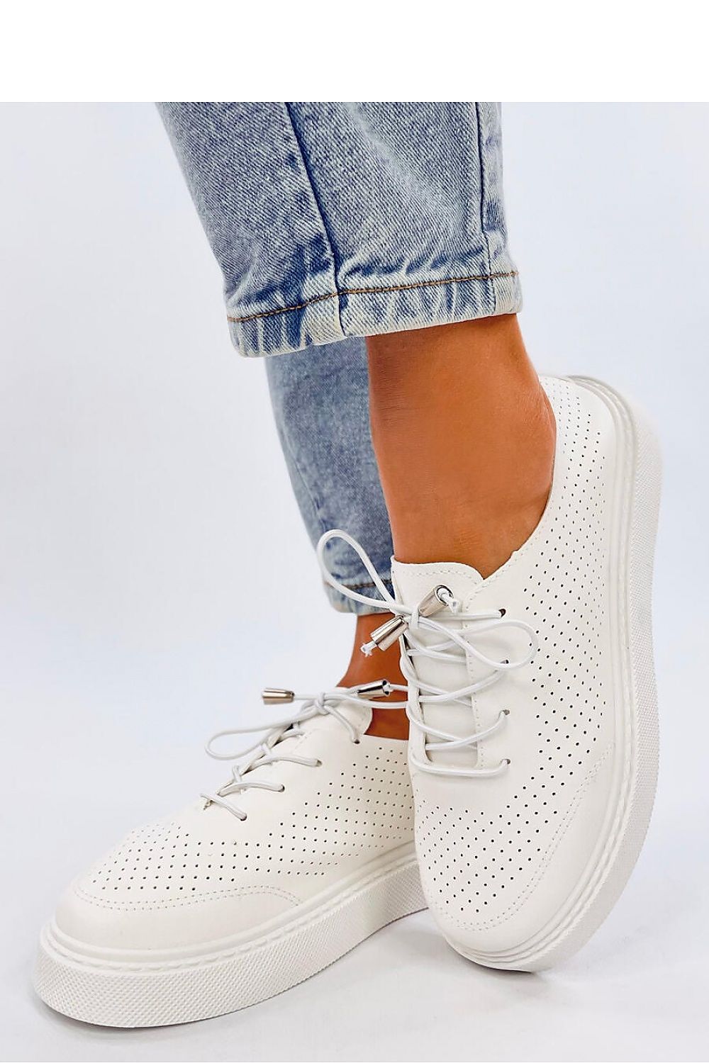 Stylish and chic Inello openwork sneakers made of soft eco leather, perfect for fashionable comfort.