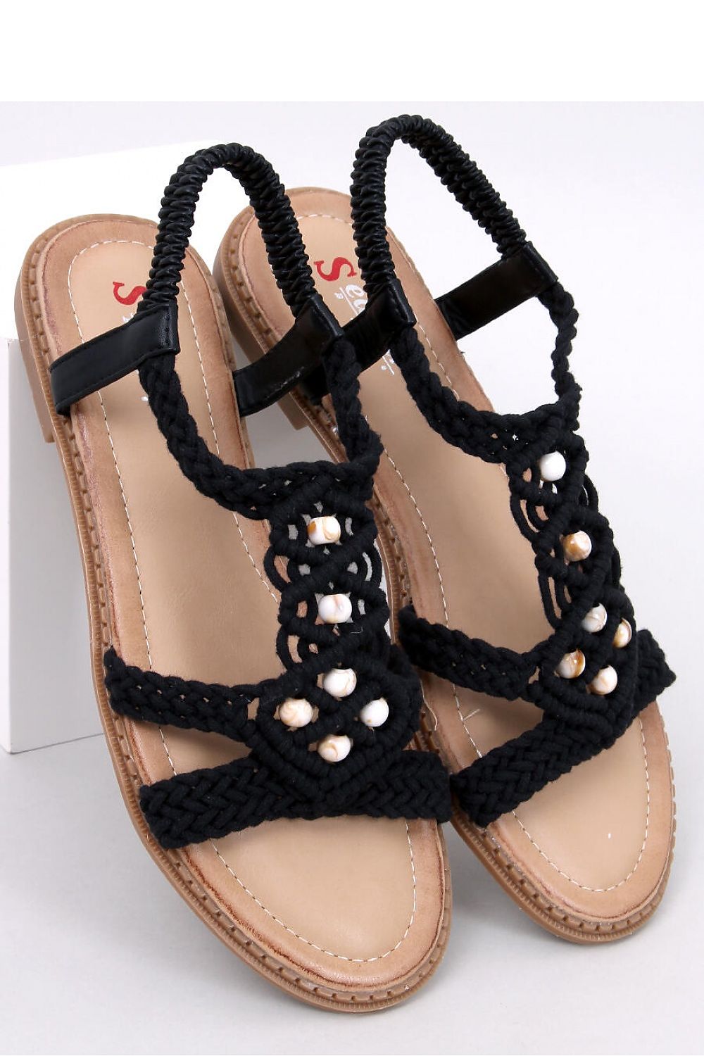 Elegant Inello Women's Boho String Sandals featuring a luxurious braided design adorned with bead accents and a comfortable soft insole, perfect for stylish summer outings.