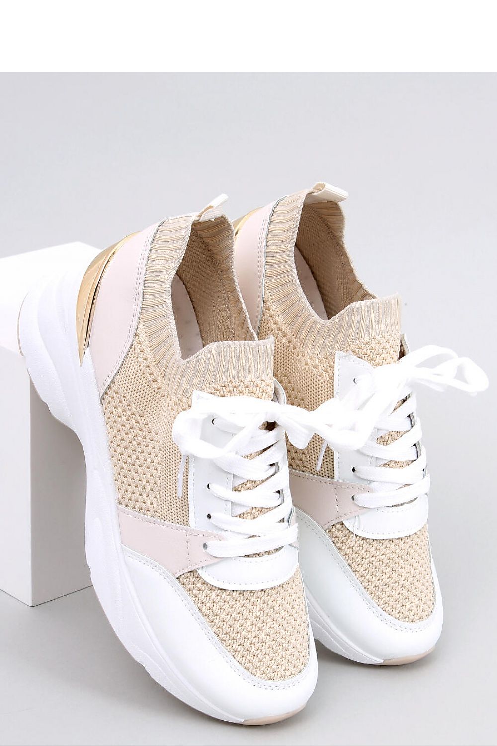 Inello women's wedge heel sneakers featuring a stylish sock-like design, offering a comfortable 6.5 cm high platform for sporty elegance.