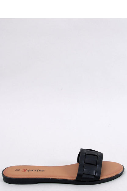 Elegant black women's flip-flops from Inello featuring braided straps, showcasing a luxurious and eco-friendly leather design, perfect for summer styling.