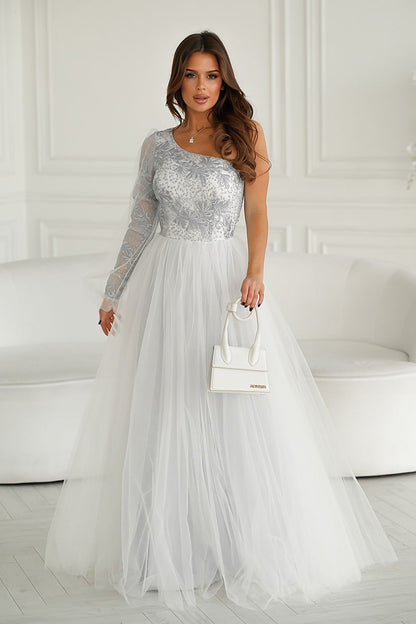 Chic and modern one shoulder prom gown by Bicotone, elegantly styled in silver lace with a voluminous mesh skirt, paired with a fashionable handbag for a complete look.
