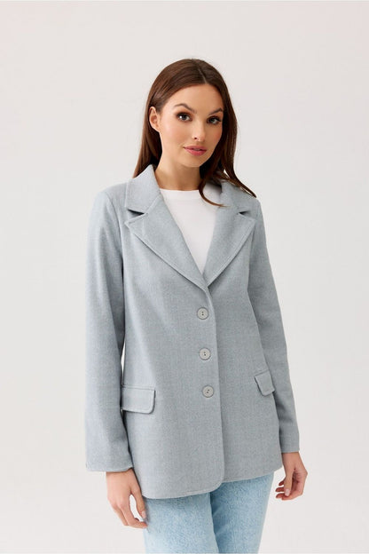 Close-up of the Freya Classic Blazer Jacket by Roco Fashion, featuring a herringbone pattern, button closure, and flap pockets, exuding timeless elegance.