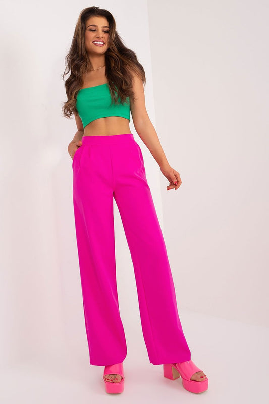 Elegant women's high waist unbuttoned trousers in vibrant pink, styled with a matching heel, showcasing a chic look by Rue Paris, perfect for sophisticated occasions.