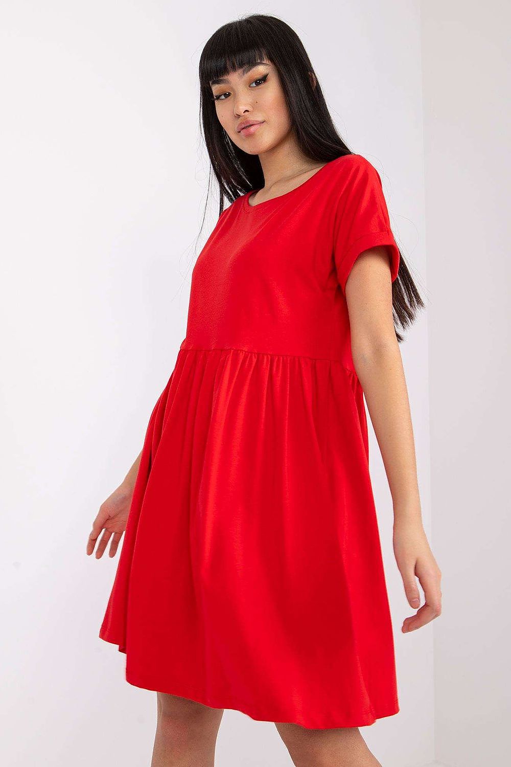A stunning red flared cotton dress with short sleeves, perfect for versatile styling, highlighted by Rue Paris.