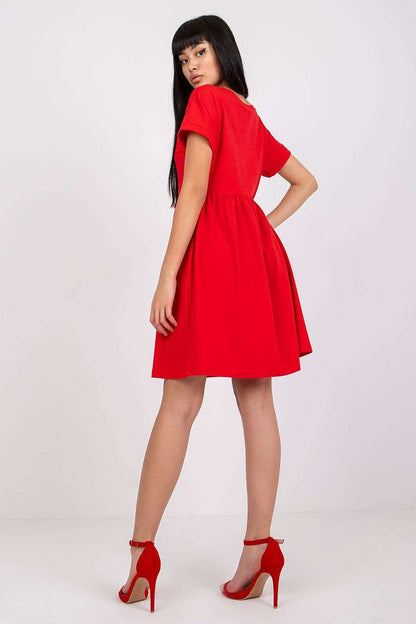 A vibrant red flared cotton dress from Rue Paris, featuring short sleeves, ideal for both casual and work-related occasions.
