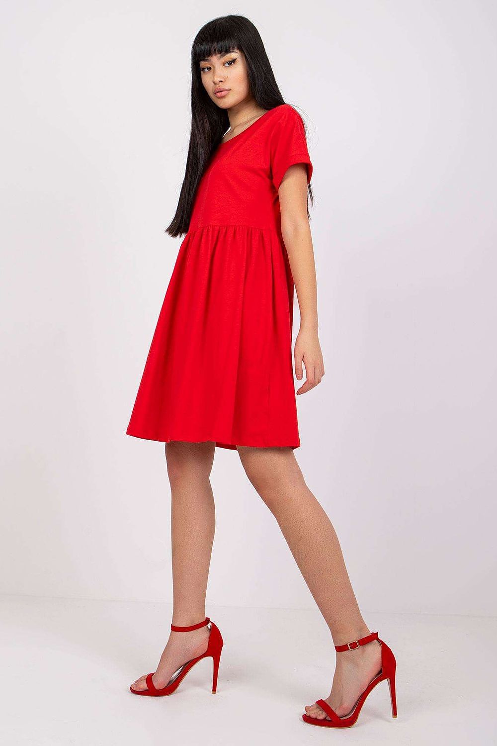 Elegantly styled Rue Paris flared cotton dress in vibrant red, showcasing short sleeves and a flattering silhouette, perfect for casual and work occasions.