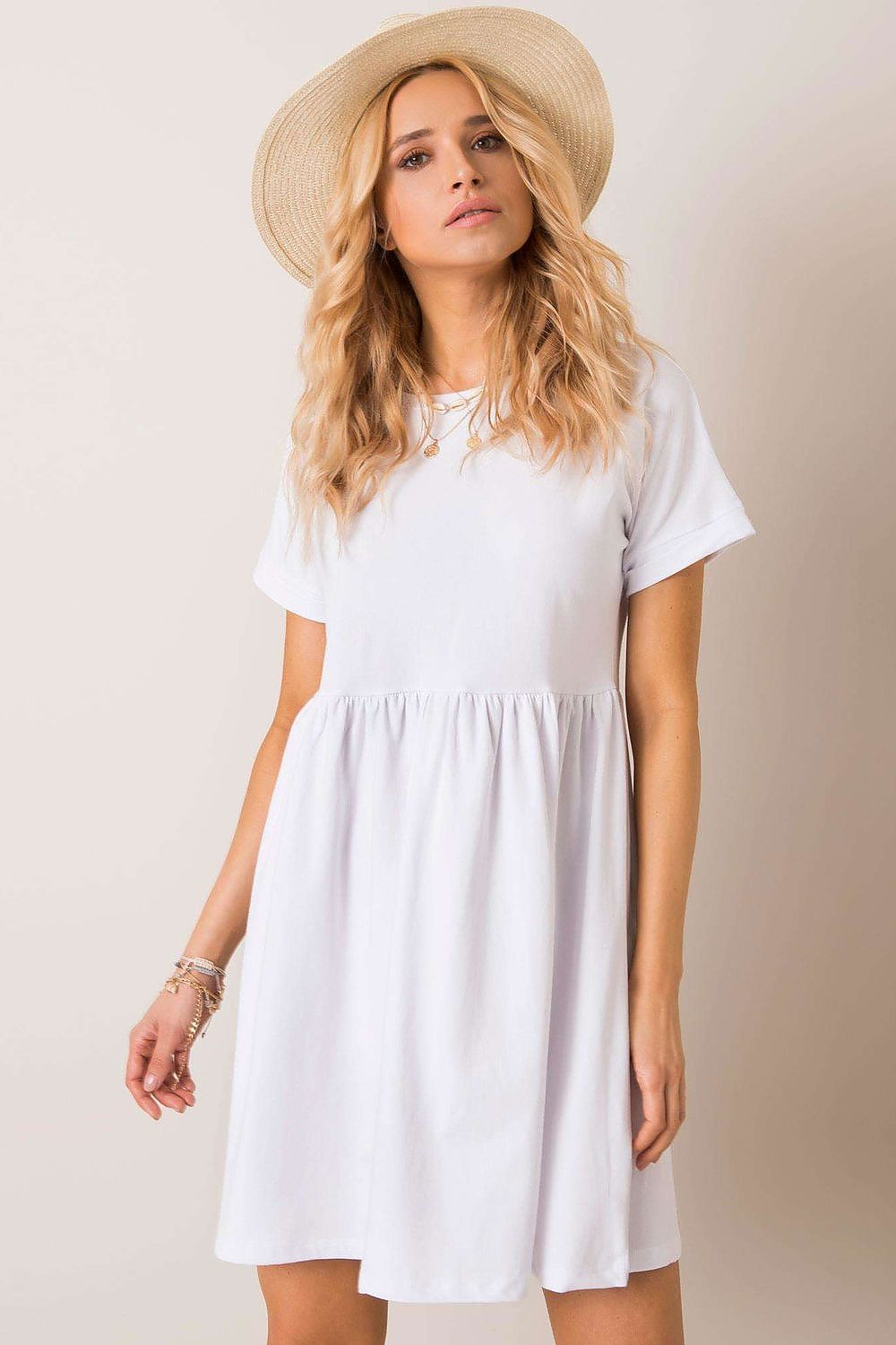 Stunning Rue Paris flared cotton dress in pristine white, adorned with short sleeves and a playful skirt, perfect for summer outings and casual gatherings.