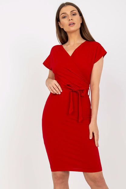 Fashionable front view of a red wrap pencil dress with short sleeves and a tie belt, ideal for summer occasions, designed by Rue Paris for chic summertime elegance.