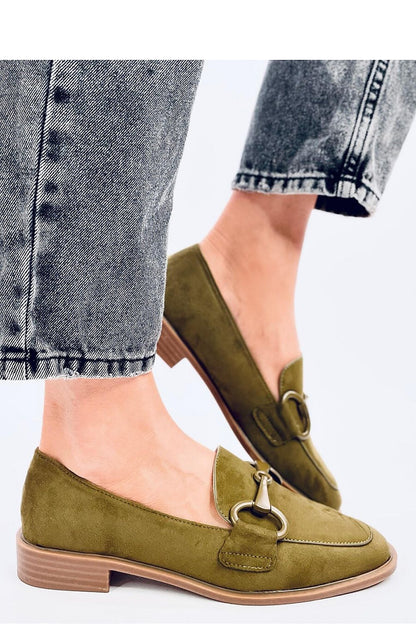 Stylish close-up of Inello women’s moccasins in ecological suede, displaying refined decorative details, perfect for fashionable outfits.