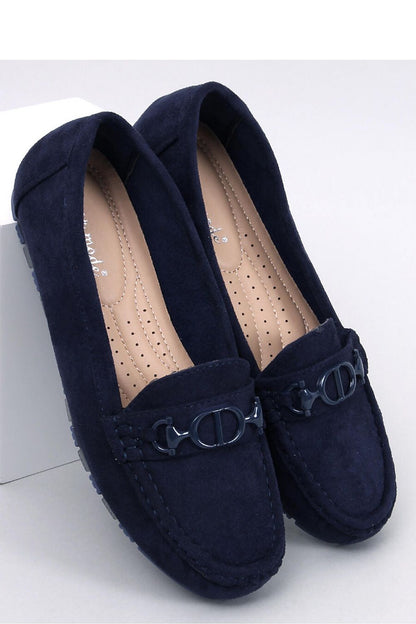 Elegant women's suede moccasins by Inello featuring unique stitching and a subtle buckle detail, displayed from an overhead view.