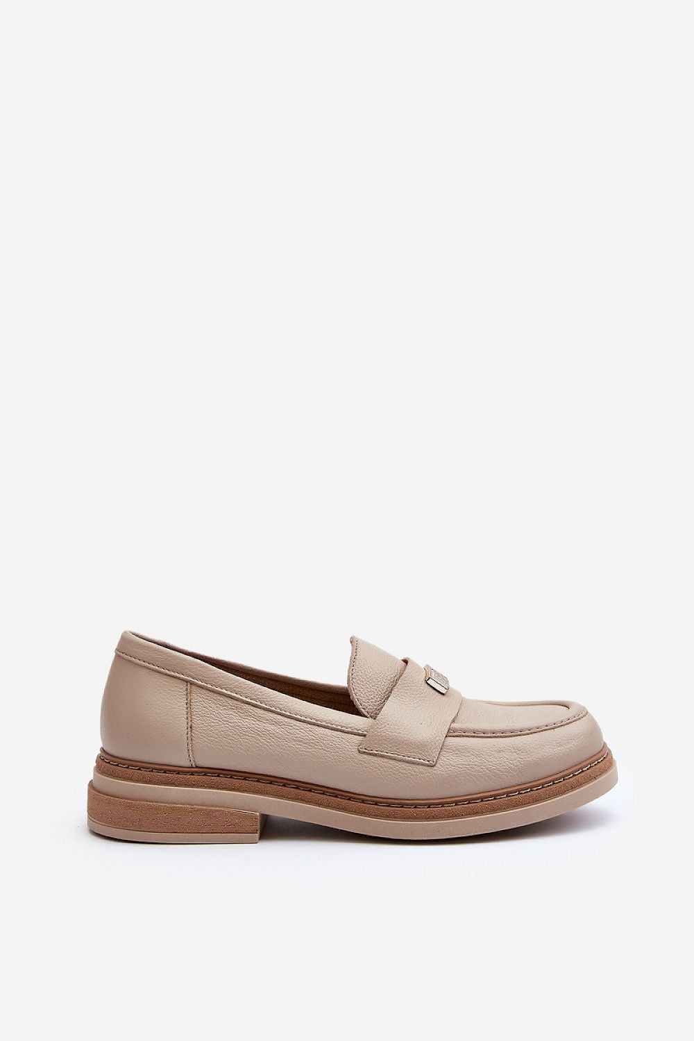 Sleek profile of beige leather moccasins showcasing a modern design, perfect for sophisticated spring looks, designed by Step in Style.