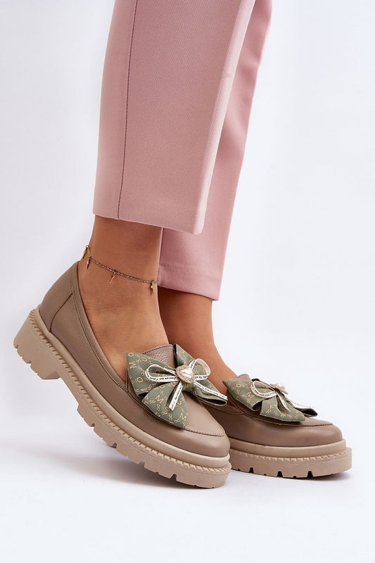Elegant luxury women's natural leather moccasins with a stylish bow, showcasing comfort and sophistication by Step in Style.