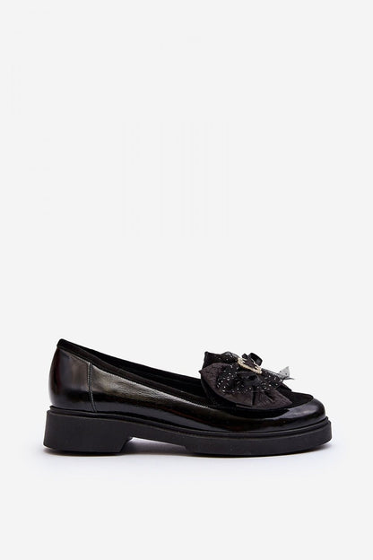 Elegant luxury women's black moccasins by Step in style, crafted from natural leather, featuring a chic bow detail and comfortable flat heel, perfect for stylish spring footwear.