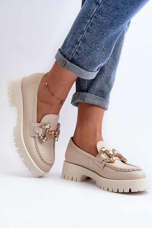 Chic CheBello moccasins in natural leather, highlighted in a trendy casual look with a decorative element, ideal for adding luxury to everyday outfits.
