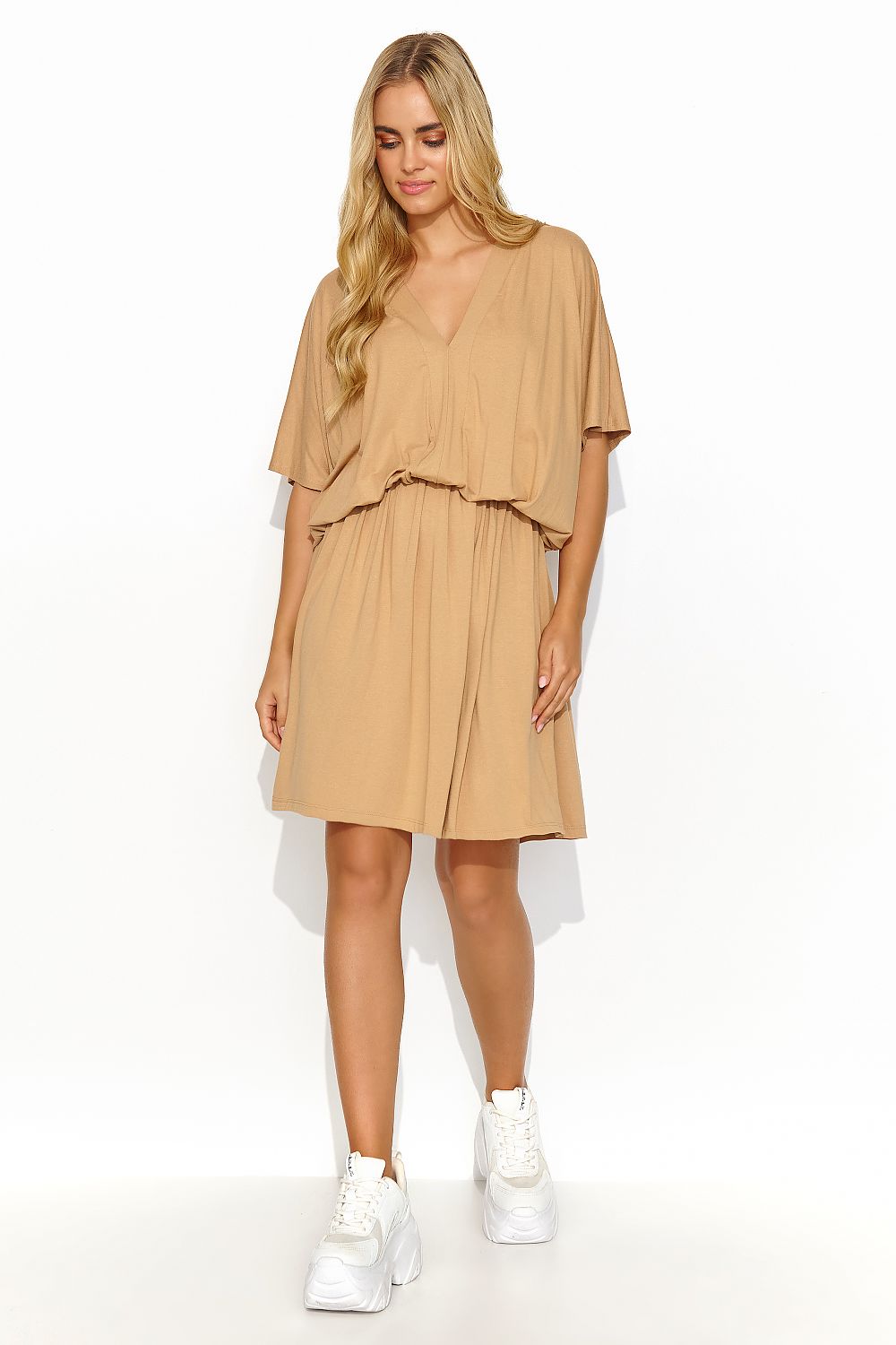 Makadamia stylish summer daydress featuring a flattering silhouette, drawstring waist, and heart neckline, ideal for chic summer outings and events.