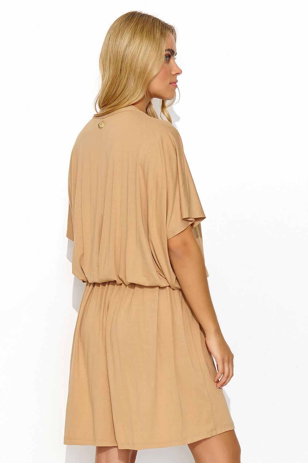 A luxurious summer daydress by Makadamia, showcasing an elegant loose fit, drawstring waist, and charming heart neckline. The dress features short sleeves and a unique gold plate detail on the back, ideal for stylish summer outings.