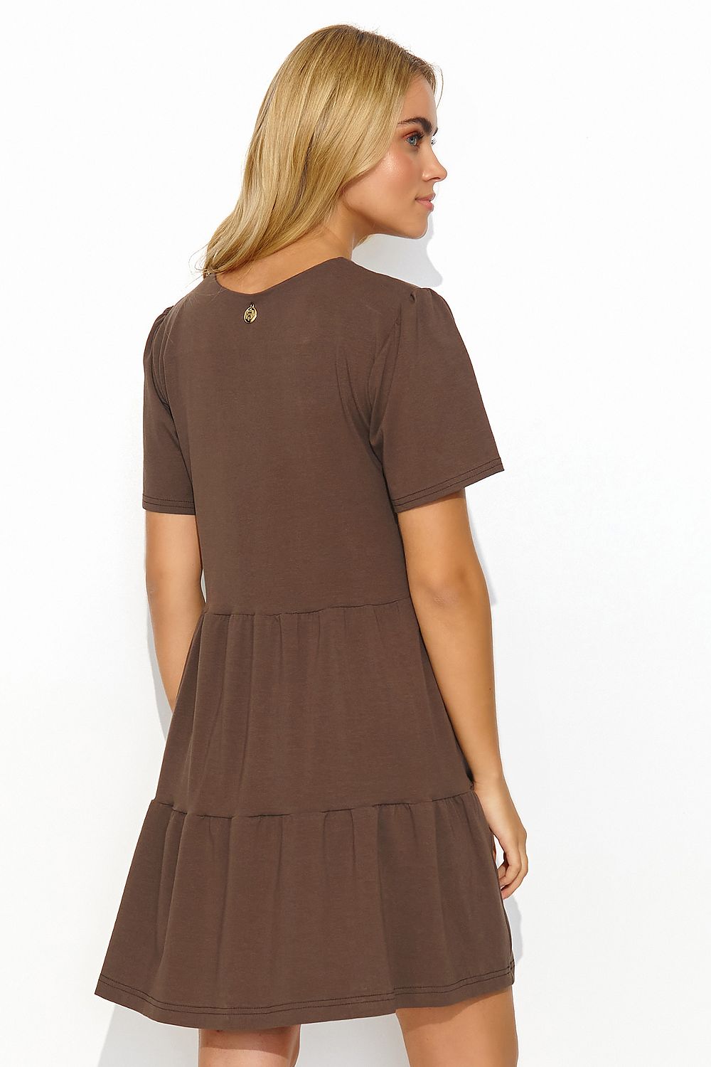 Elegant Makadamia summer daydress in brown, featuring a tiered design, short sleeves, and a subtle v-neck, showcasing a gold detail at the back for added sophistication.