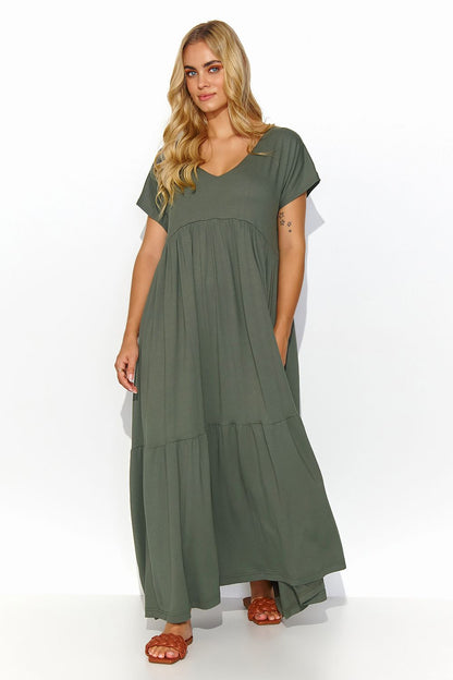 Elegant Makadamia Airy Viscose Maxi Dress featuring a chic V-cut neckline and gold-plated detail, styled effortlessly in a soft olive green hue, perfect for a refined casual look.