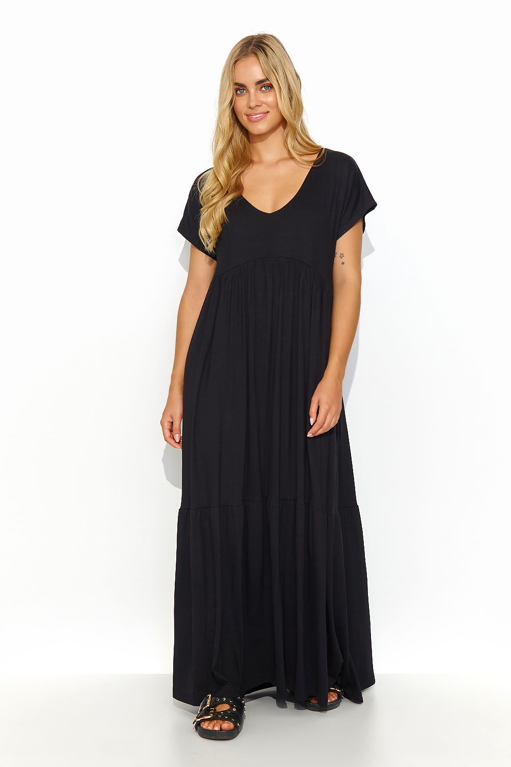 Elegant black maxi dress by Makadamia featuring a V-cut neckline, loose cut, and flowing silhouette, perfect for casual chic styling.