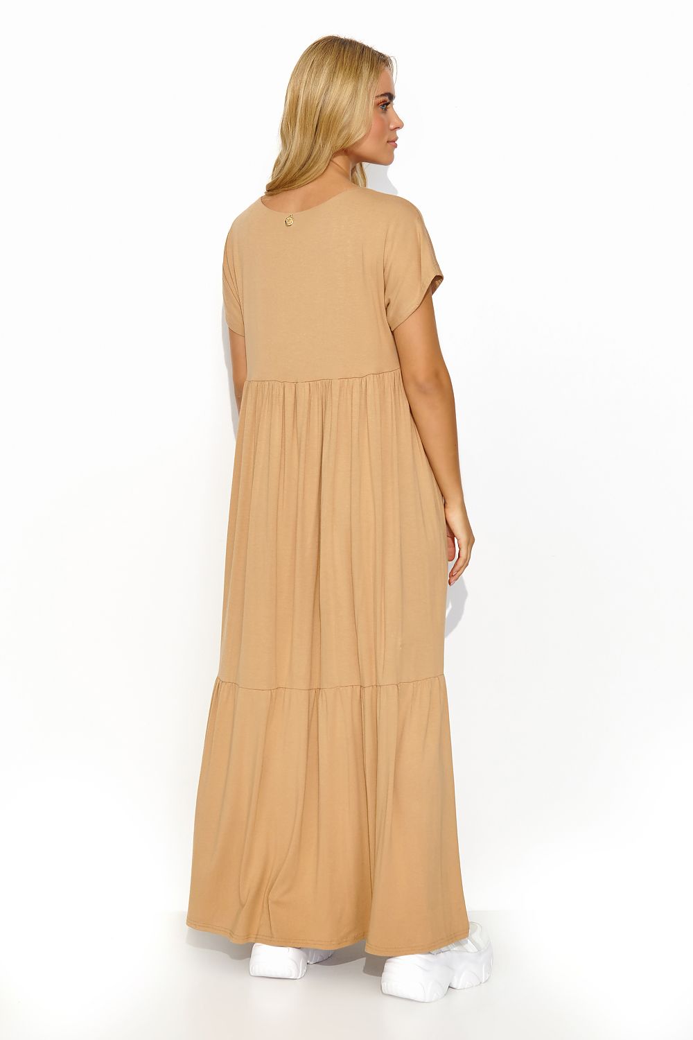 Back view of the stylish beige maxi dress by Makadamia featuring a refined gold-plated detail, exemplifying casual luxury.