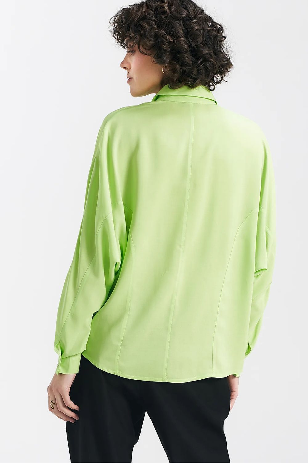 Back view of a luxurious lime oversize long sleeve shirt by Nife, highlighting its unique design and elegant silhouette.